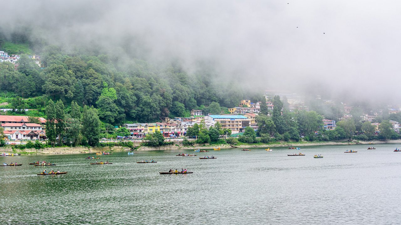 Naini Lake surrounded by Himalayan peaks in Nainital, Uttarakhand